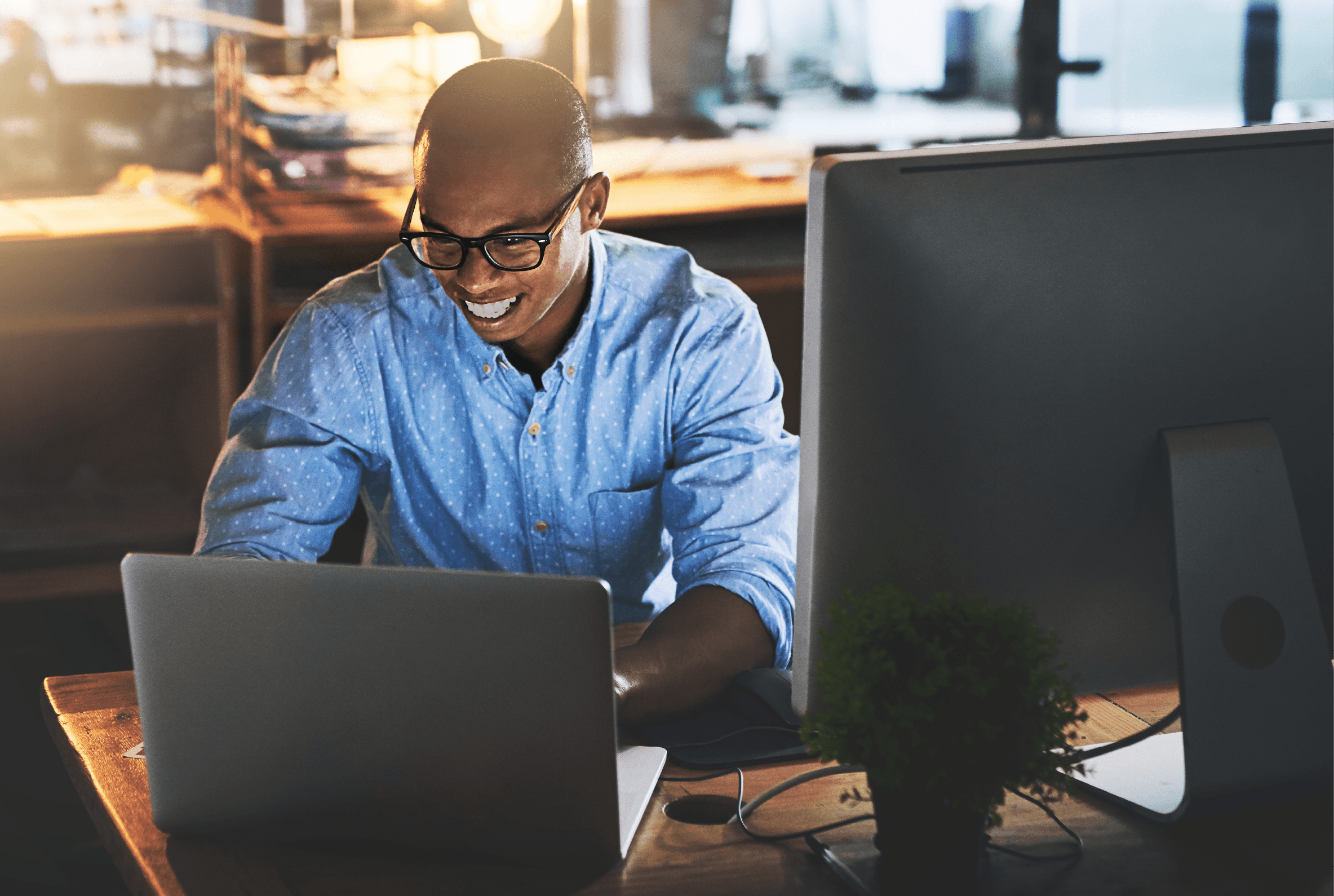 Man using computer for capacity intelligence