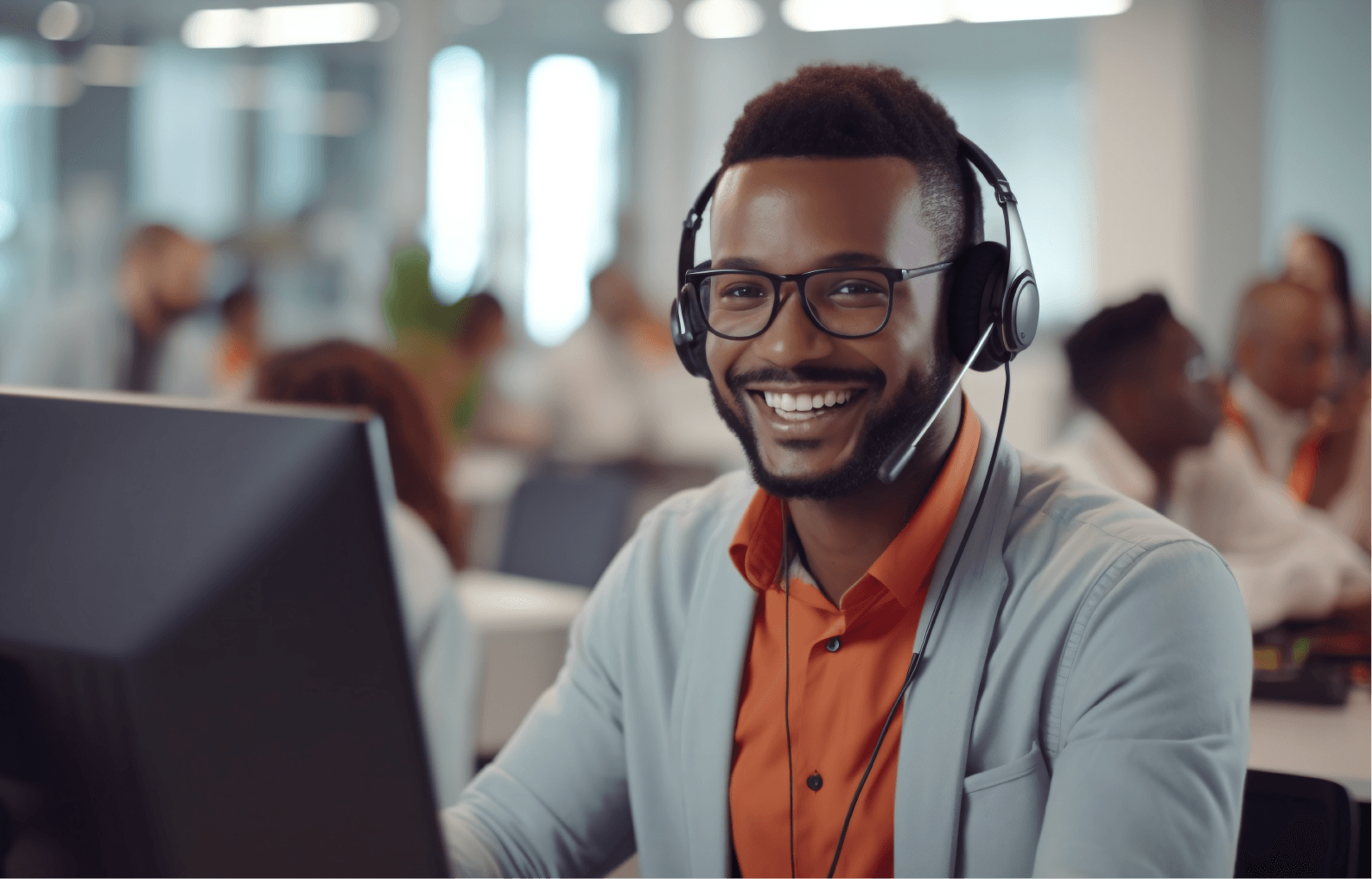 Man using headset to talk with customer